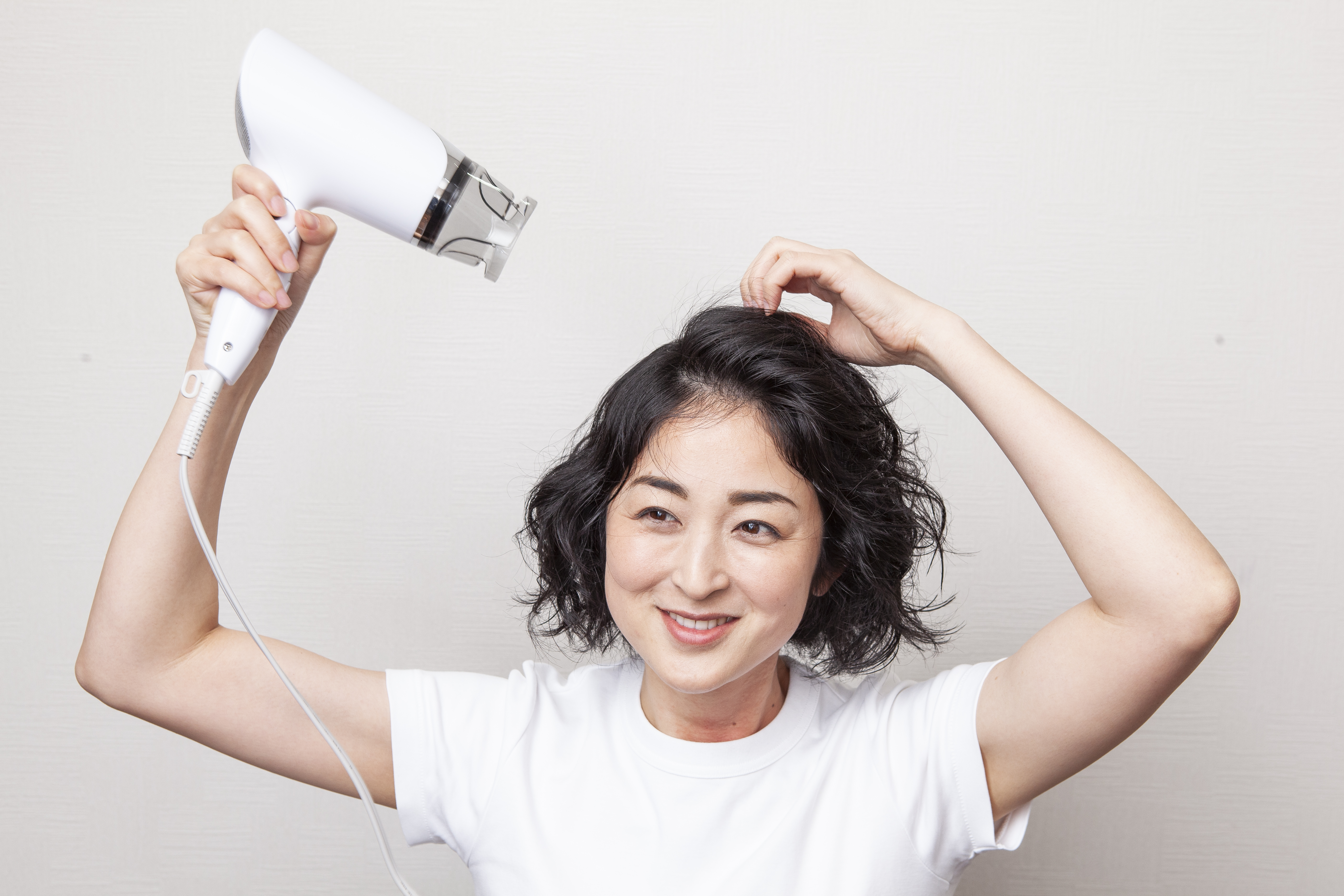 髪の分け目を変える